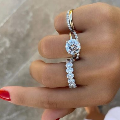 multiple engagement rings on hand